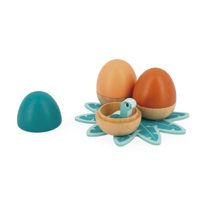 Janod Dino Surprise Eggs open with dinosaurs inside.