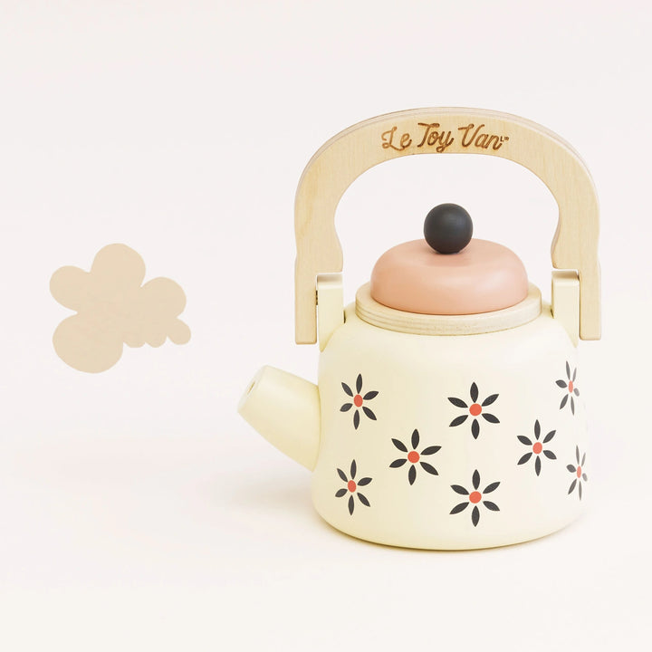 Plastic-free wooden toy kettle with handle.