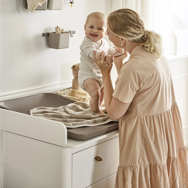 Leander Classic baby changing station with drawers.