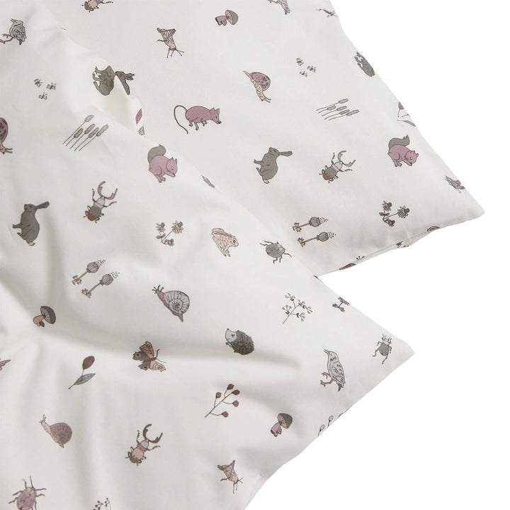 Dusty rose junior bedding with nature-inspired design.