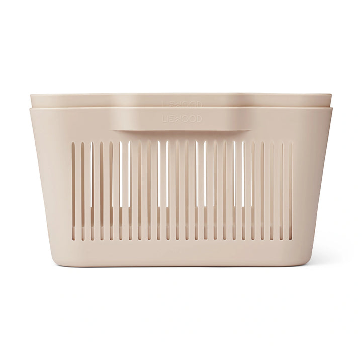 Liewood lightweight perforated storage basket with sturdy handles.