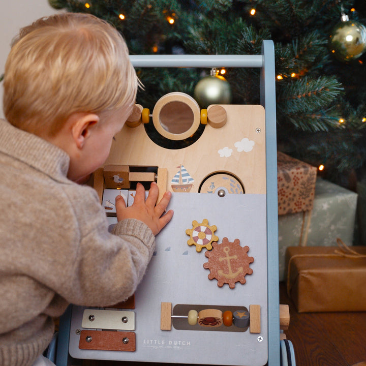 This multi wooden baby activity walker encourages physical activity and early learning.