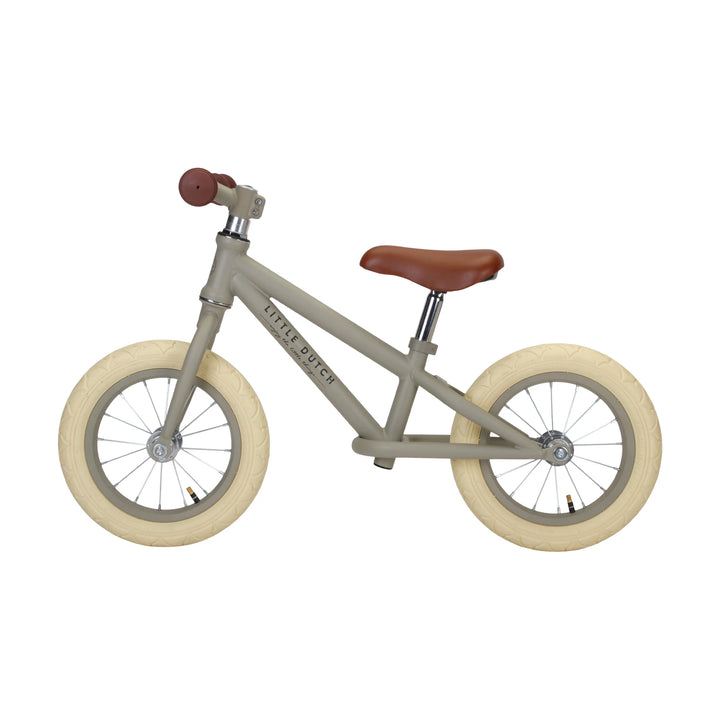 Little dutch balance bike is made with durable metal frame in a stylish matte olive finish