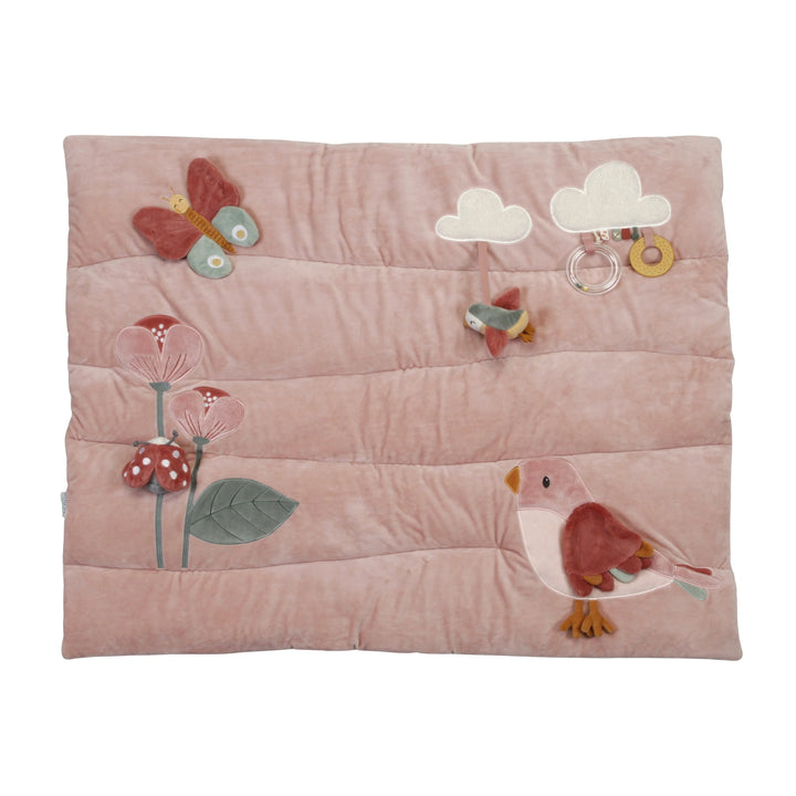 Pink floral playmat with butterfly design.