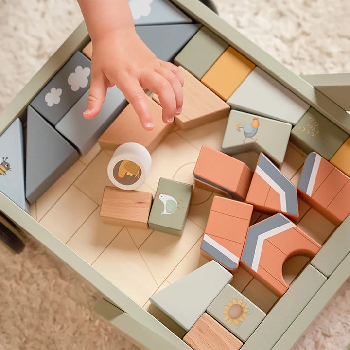 Toddler-friendly baby walker and building set with blocks