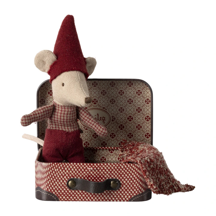 Tiny Christmas mouse baby with blanket in a travel suitcase.