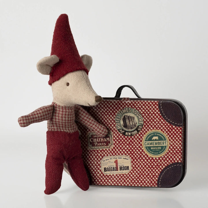 Tiny Christmas mouse baby with blanket in a travel suitcase.