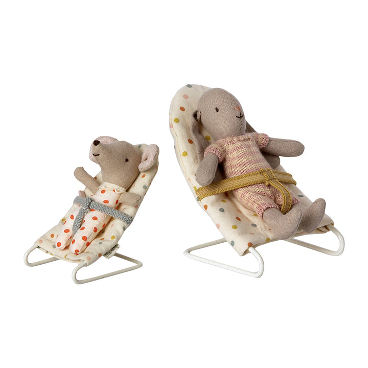 Maileg, baby mouse, and rabbit are sleeping peacefully in the Baby Sitter chair.