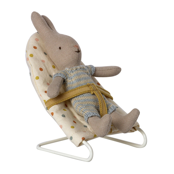 The Maileg Micro Babysitter Chair features dotted fabric.