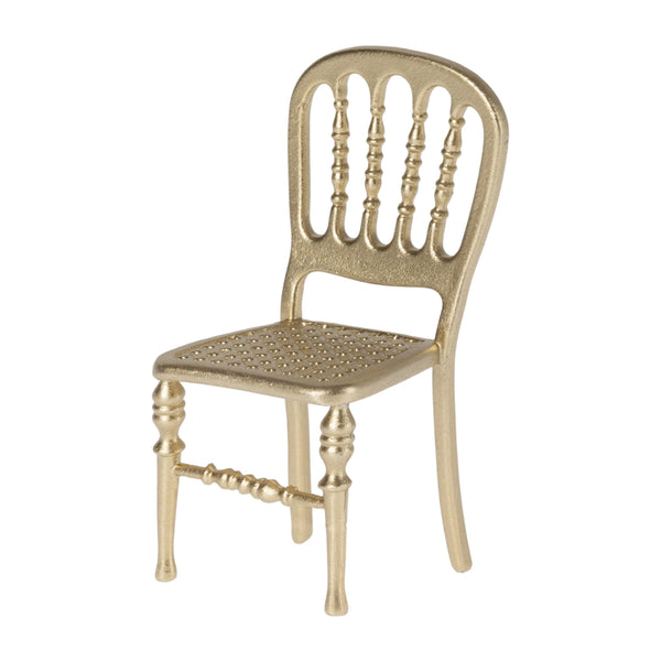 The Maileg Gold Chair is a perfect addition to any dollhouse.