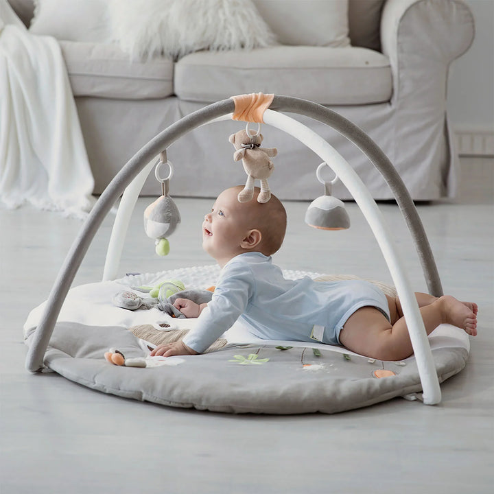 Baby enjoying the MiniDream Jumbo Baby Play Gym with detachable toys