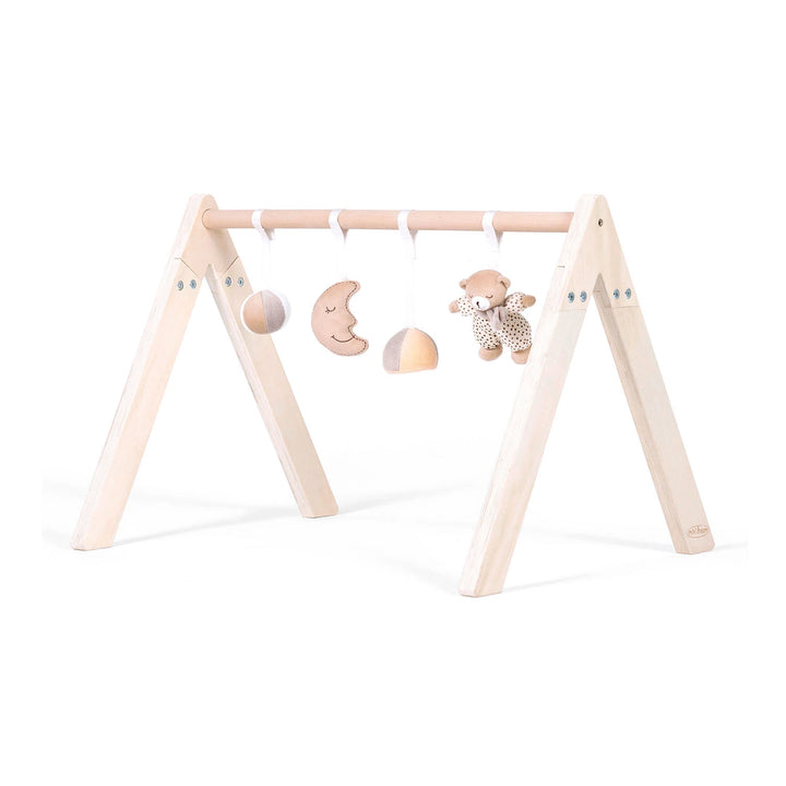 The set includes a wooden baby gym with a natural finish and four hanging toys: a crescent moon, a teddy bear, and two fabric balls.