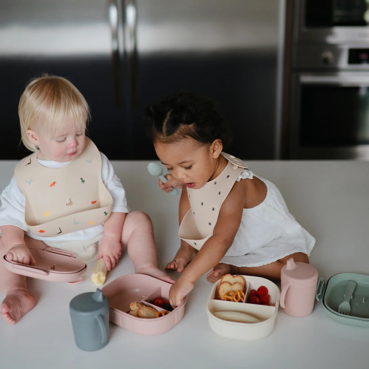 Safe and comfortable Mushie bib for babies.