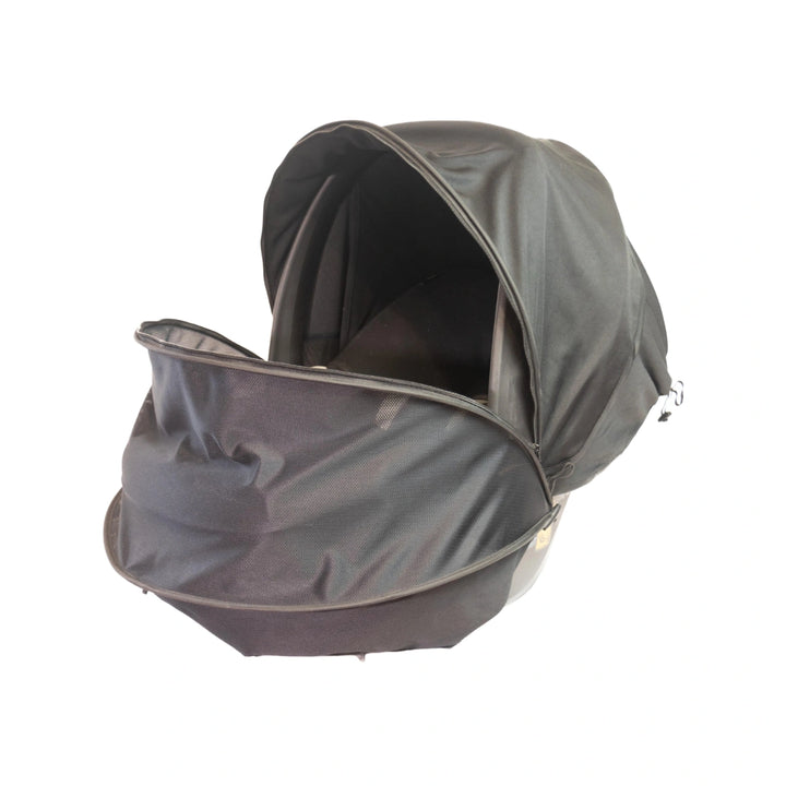 Baby napping under breathable sun shade cover.