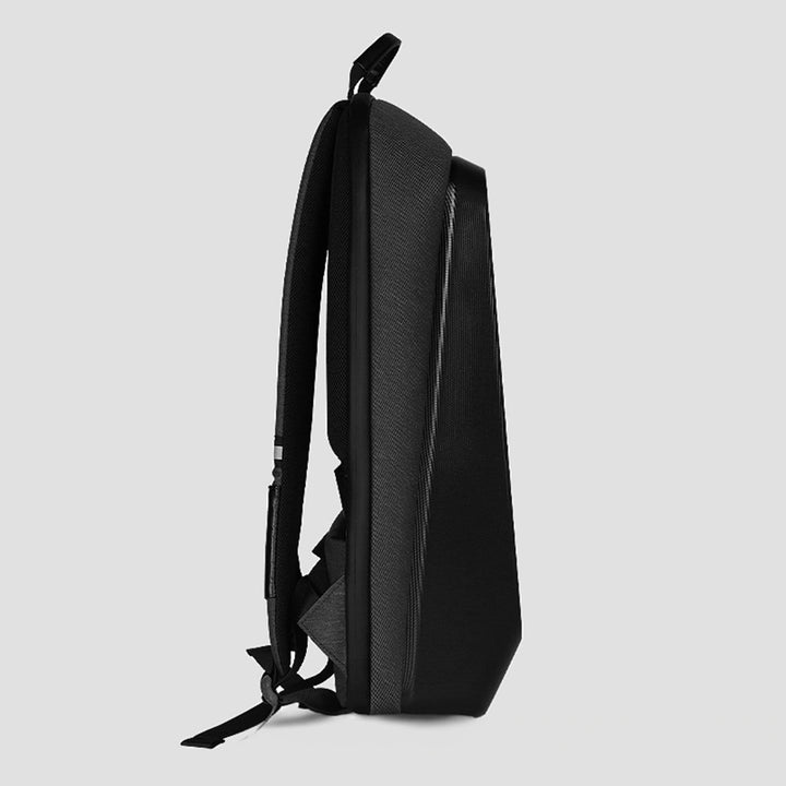 Side view of the laptop backpack highlighting its slim, modern profile against a white background.