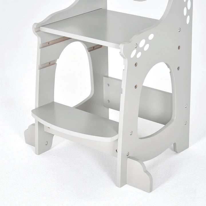 Close-up of the step details on the Dino Grey toddler learning tower, highlighting anti-slip steps and sturdy construction for added toddler safety.