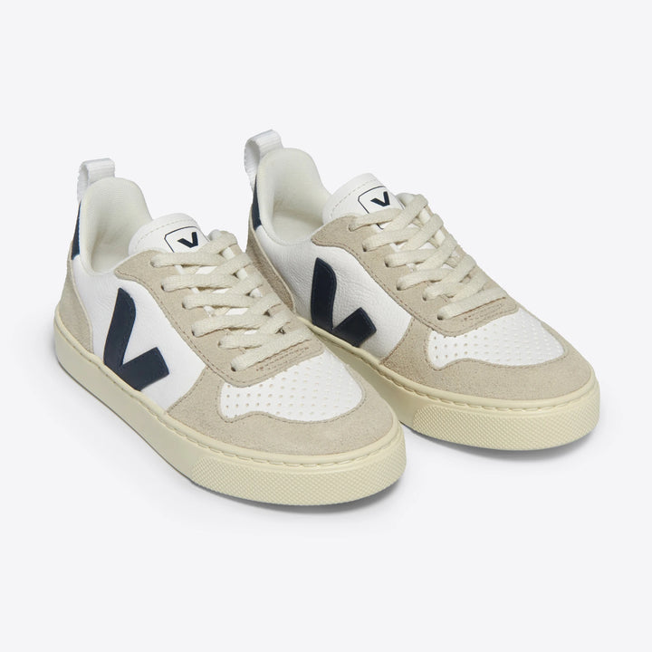 White and almond Veja Kids Trainers full view.