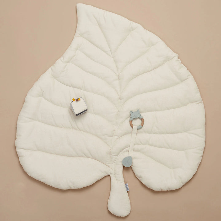 Wooden Baby Gym with a soft leaf playmat.