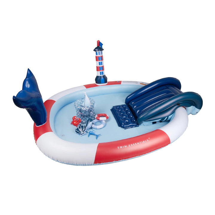 Adventure Kids Paddling Pool set up in a backyard - Displaying the colorful design and large size, perfect for outdoor summer fun.