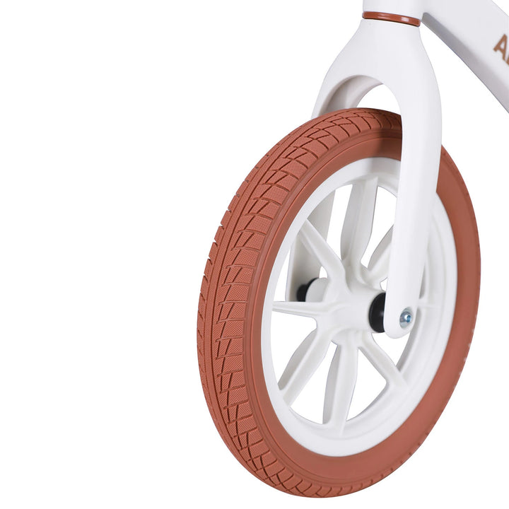 Balance bike features puncture-proof PU tires for a smooth ride.