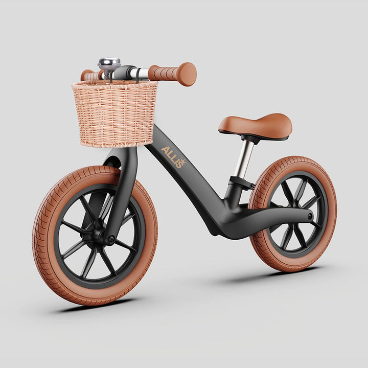 Stylish black balance bike with a removable bell and basket for kids