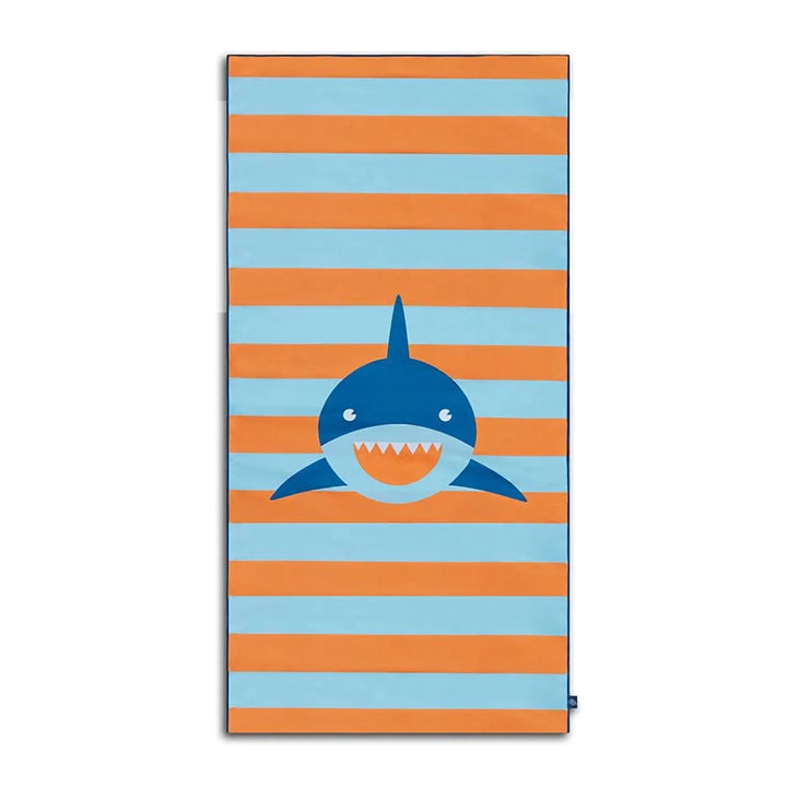 Kids Beach Towel with Shark Print spread out on the sand - Displaying the cool and trendy shark design.