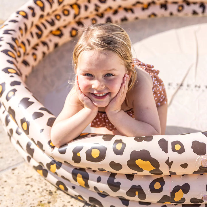 Happy children enjoying endless hours of summer fun in the uniquely designed Panther print paddling pool.