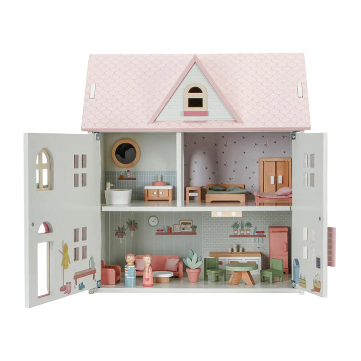 The front view of the Little Dutch Wooden Doll House in pink shows off its cute pink roof and doors that open.