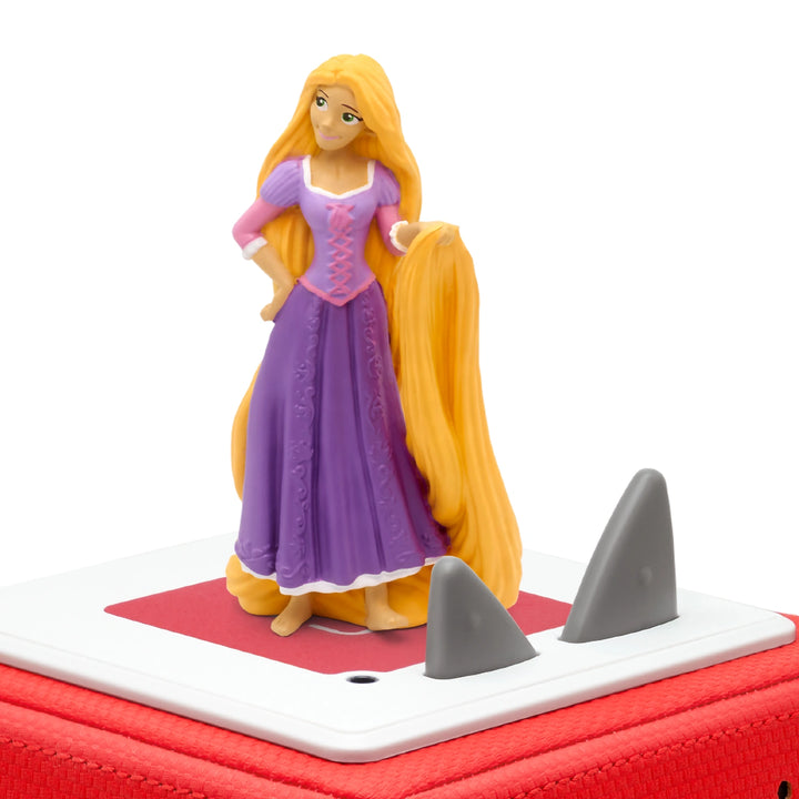 The hand-painted Rapunzel Tonie figurine placed on the Toniebox, ready to play the enchanting story of Disney's Tangled.