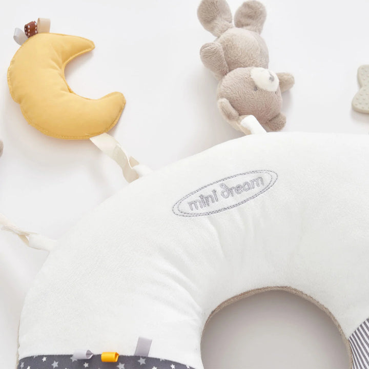 The ergonomic tummy time pillow for infant core strength development