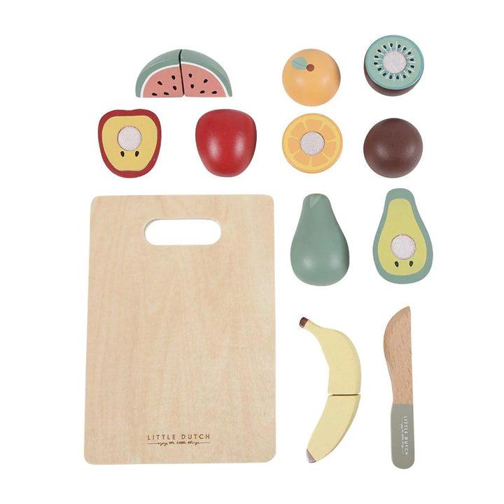 A vibrant wooden fruit set is arranged on a table, with a wooden knife and cutting board positioned beside it, ready for imaginative play.